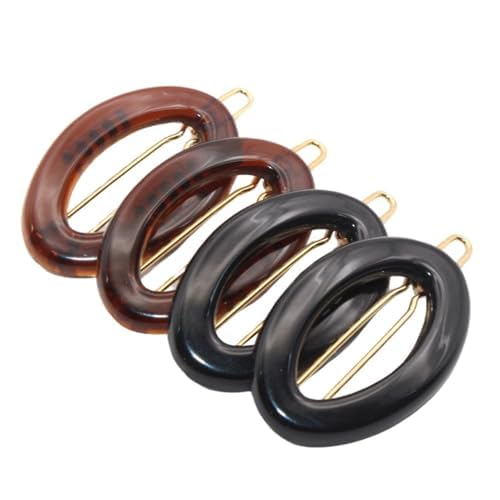 Set of four hair clips in tortoiseshell and black on a white background