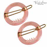 Two pink hair clips with gold hardware on a white background, branded 'French Amie'.