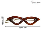Brown hair clip with measurements and 'Parcelona' branding on a white background