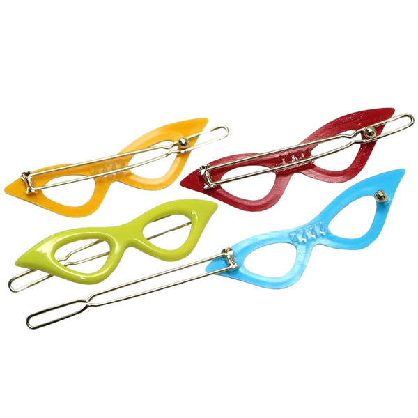 Four colorful cat-eye hair clips on a white background