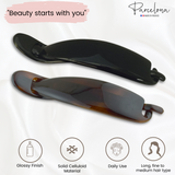 Two hair clips with 'Parcelona' branding on a light background.