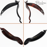 Four views of a hair clip with 'Parcelona' branding on a white background.