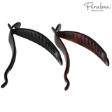 Two hair clips, one black and one tortoiseshell, on a white background with 'Parcelona' branding.