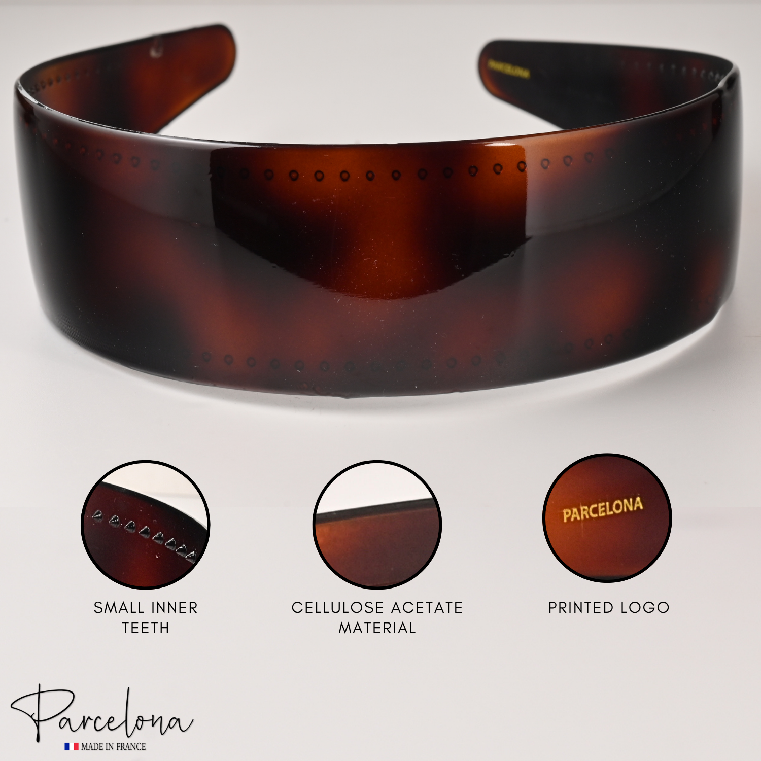 Close-up of Parcelona logo on French cellulose acetate headband