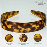 Tortoise acetate headband with inner teeth and Parcelona logo close-ups