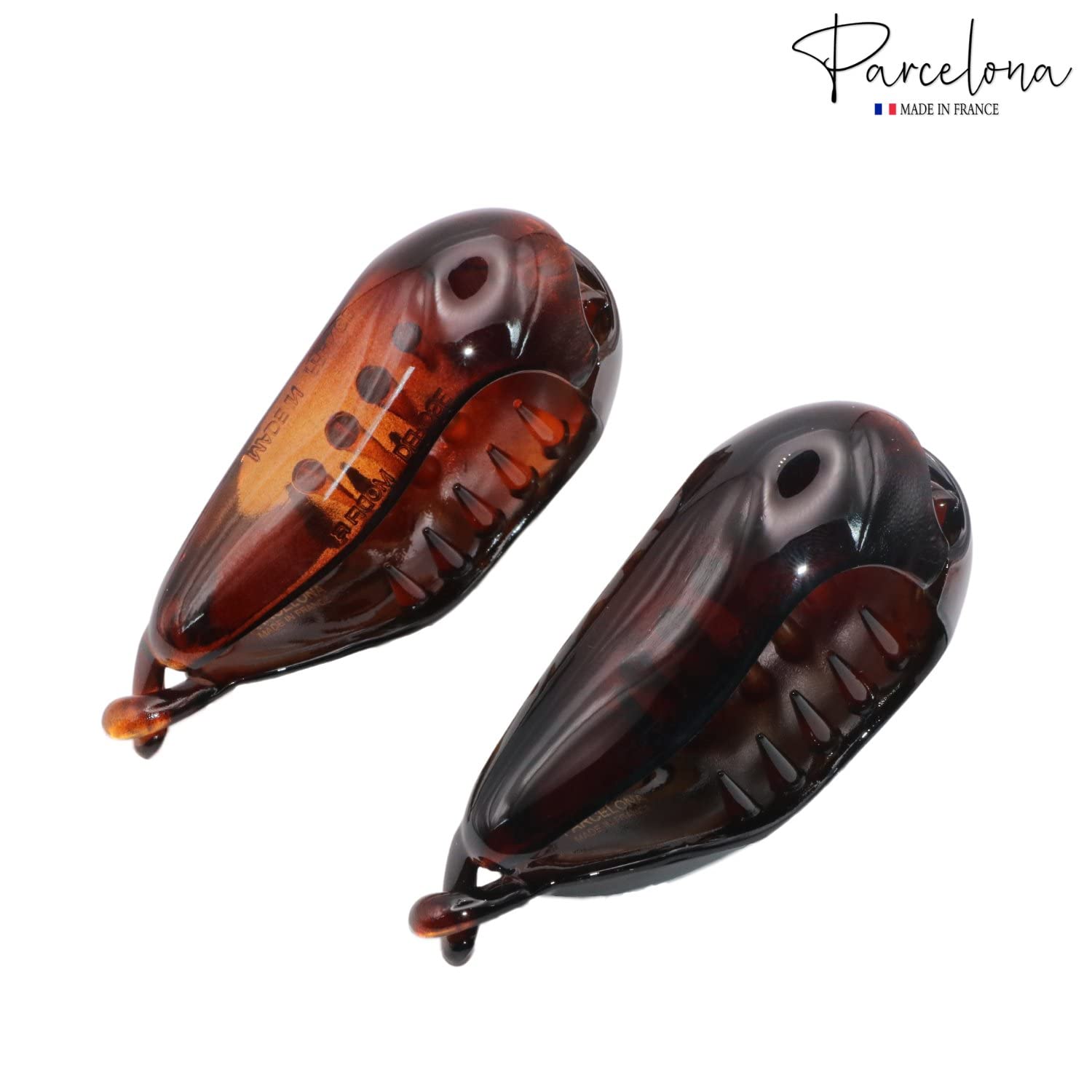 Two brown hair clips with 'Parcelona' branding on a white background