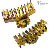 yellow hair combs with black accents on a white background, featuring the 'Parcelona' brand.