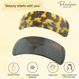 Two hair accessories with 'Parcelona' branding on a beige background.