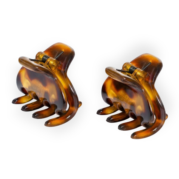 Two Savana hair clamps on a white background