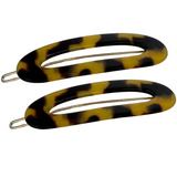 Two hair clips on a white background