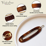 Brown hair clip on a beige background, featuring text about French Amie brand and product features.
