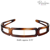 Brown tortoiseshell headband with measurement label on a white background, featuring the 'Parcelona' brand.