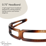 Tortoiseshell headband with text describing its features on a white background