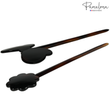 Two hair sticks with tortoiseshell design on a white background, branded 'Parcelona'.