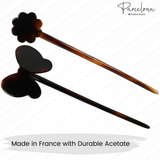 Two tortoiseshell hair sticks with decorative ends on a white background, branded 'Parcelona'.