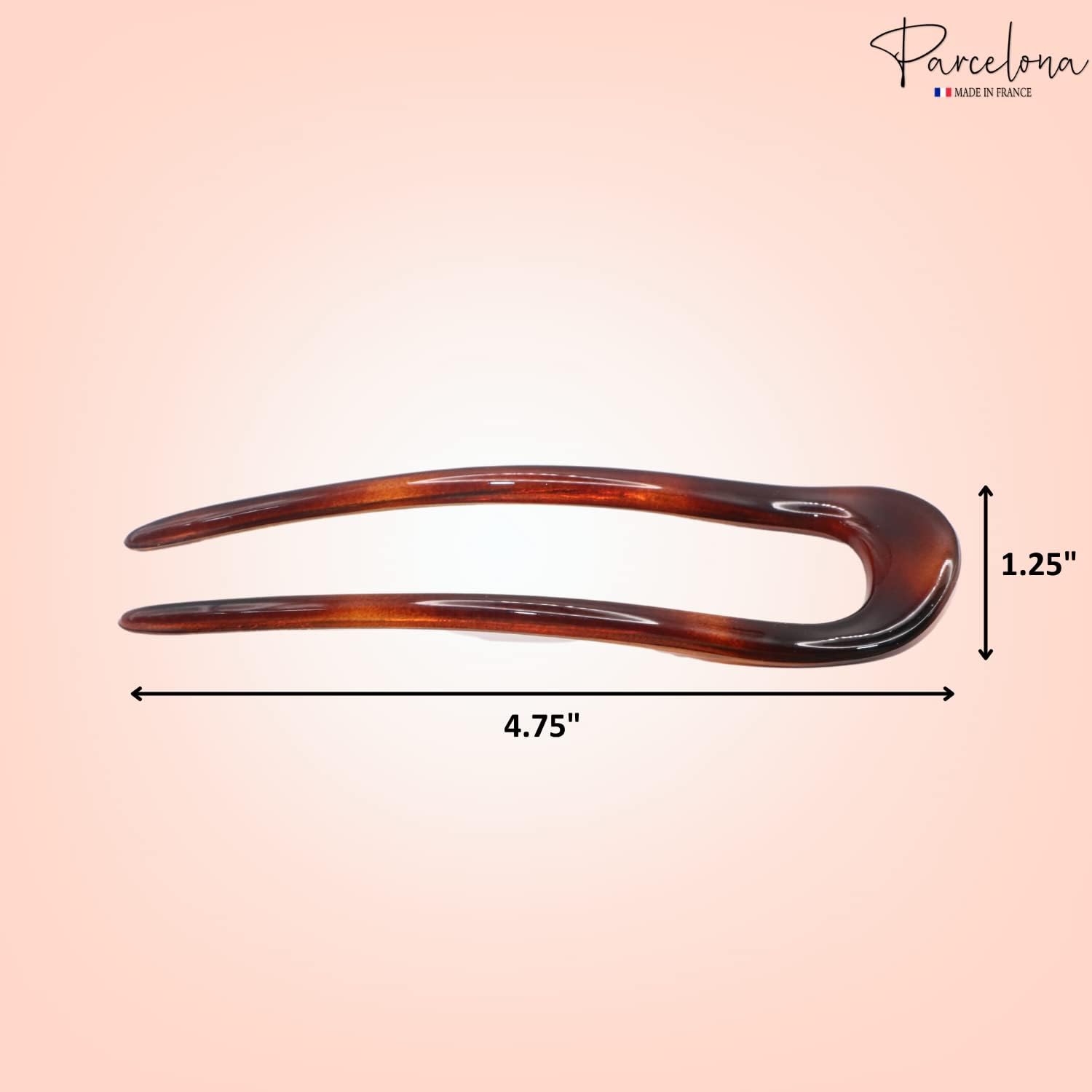 Havana brown hair clip with measurements on a pink background