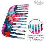 Colorful hair comb with floral design and 'Parcelona' branding on a white background