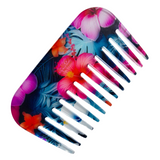 Hair comb with tropical floral design on a white background