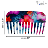 Colorful floral-patterned comb with dimensions and 'Parcelona' branding.