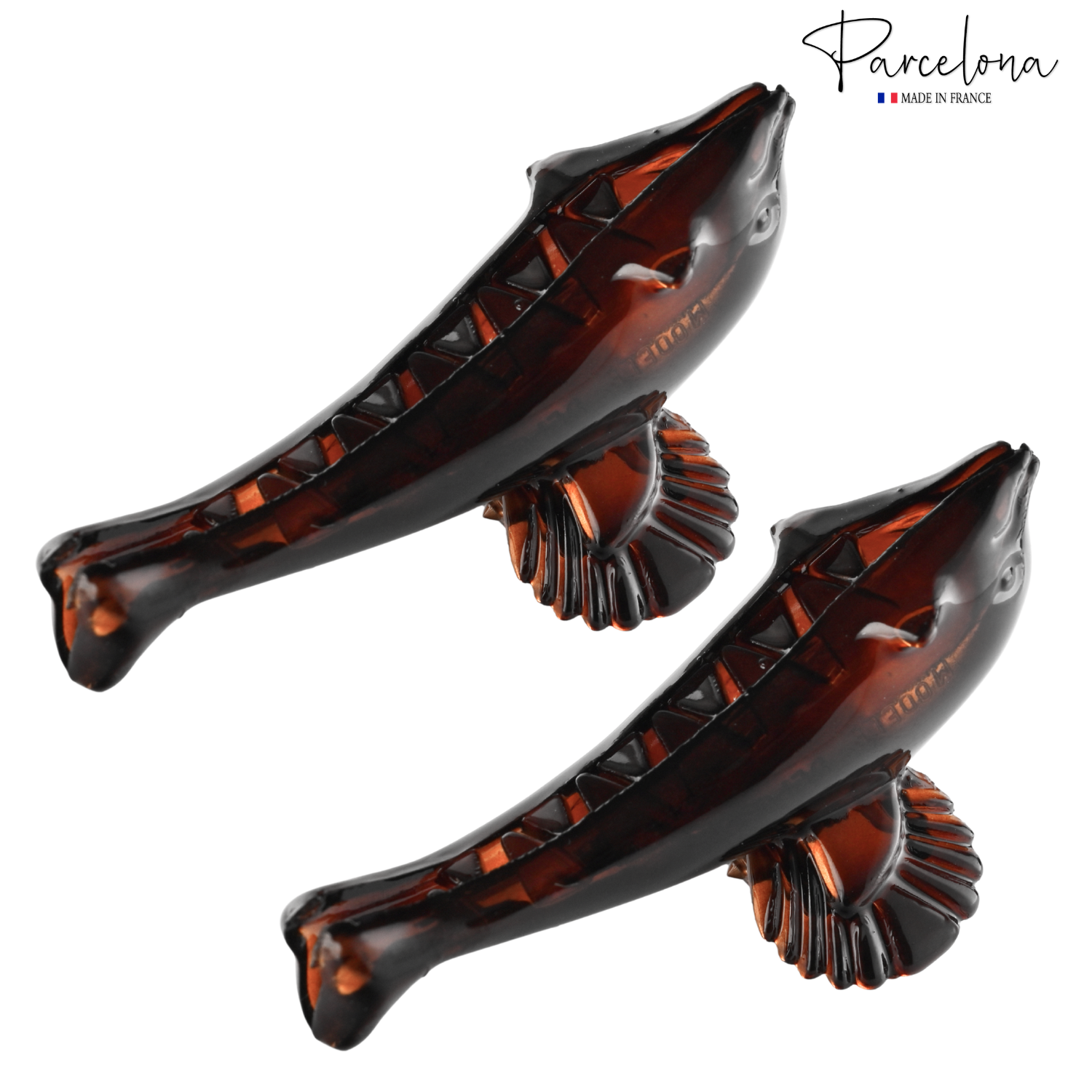 Side view of dolphin-shaped French acetate hair clip with visible clasp teeth