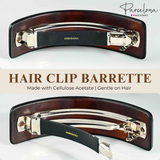 Hair clip barrette with 'Parcelona' branding on a white background
