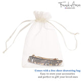 Onyx-patterned accessory in a free sheer drawstring bag with 'French Anie' branding.