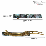 Hair clip with measurements on a white background