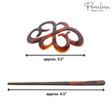 Tortoiseshell hair clip with measurements and 'Parcelona' branding on a white background