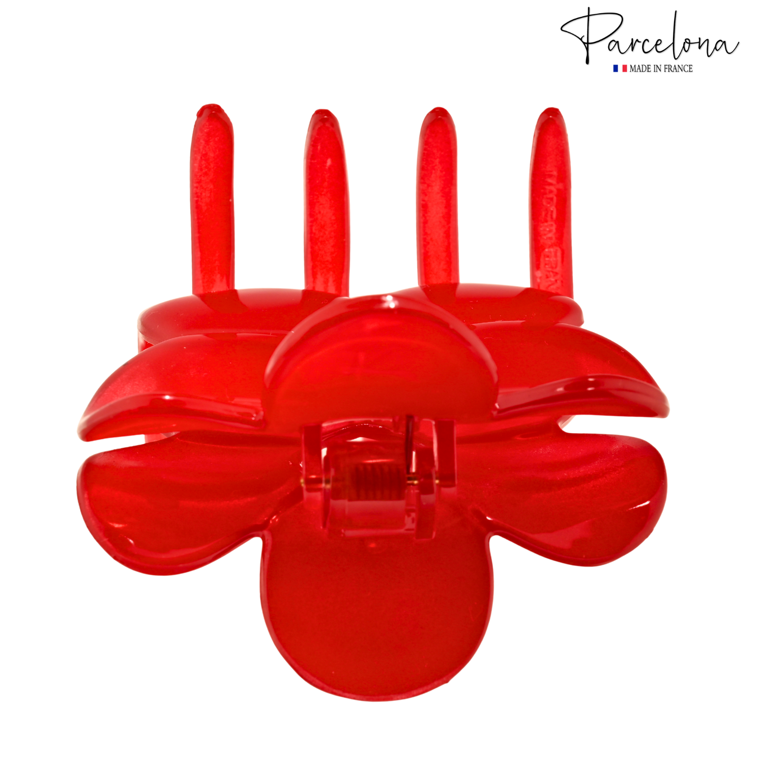 Red hair clip with 'Parcelona' branding on a white background