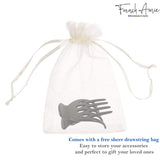black hair clip in a free sheer drawstring bag with 'French Amie' branding.