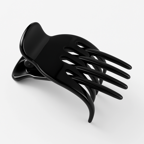 Black hair claw on a white background