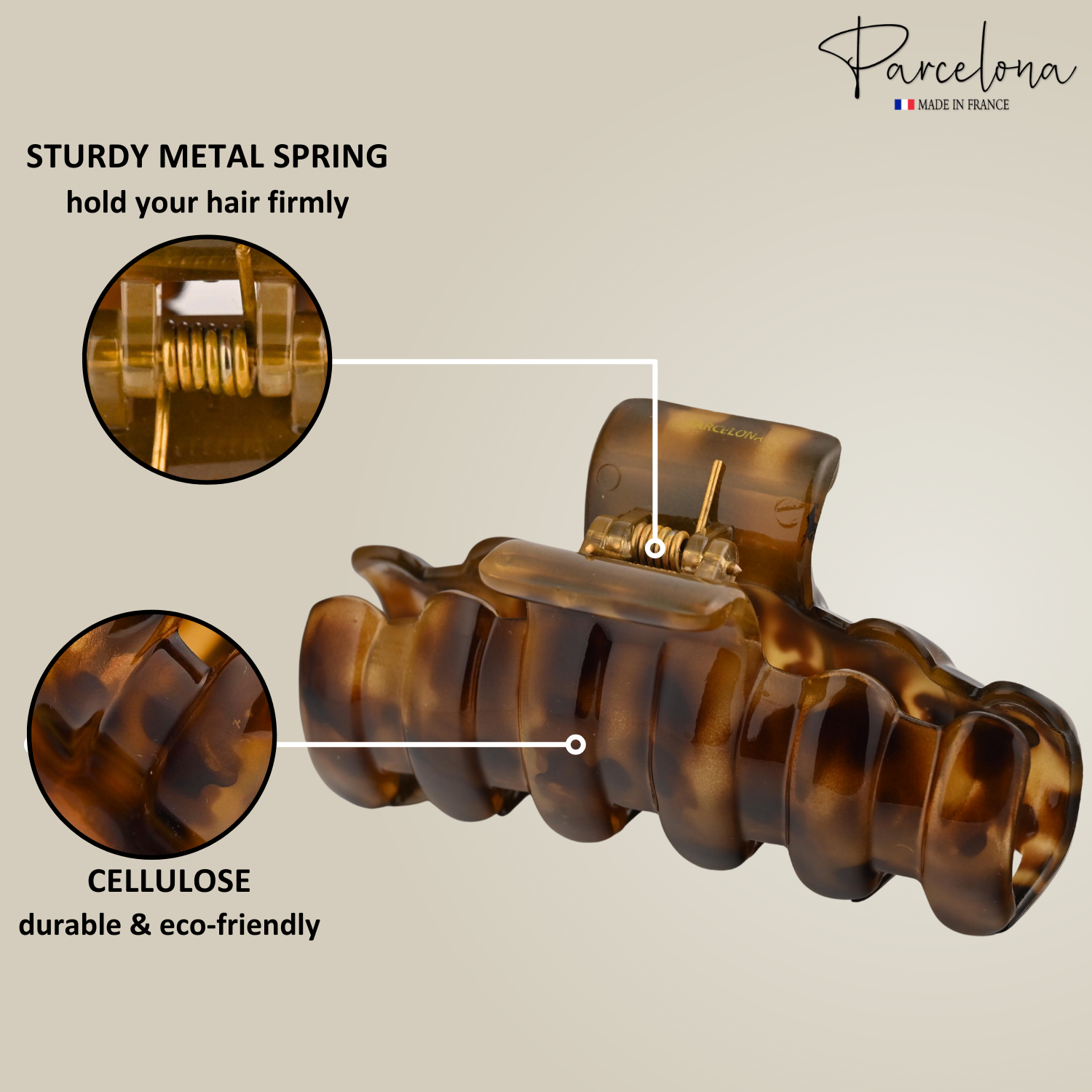 Brown hair clip with metal spring and cellulose material, labeled 'Parcelona' on a beige background.