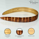 Golden inside headband with 'Parcelona' branding on a white background