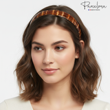 Woman wearing a decorative headband with 'Parcelona' branding on a white background