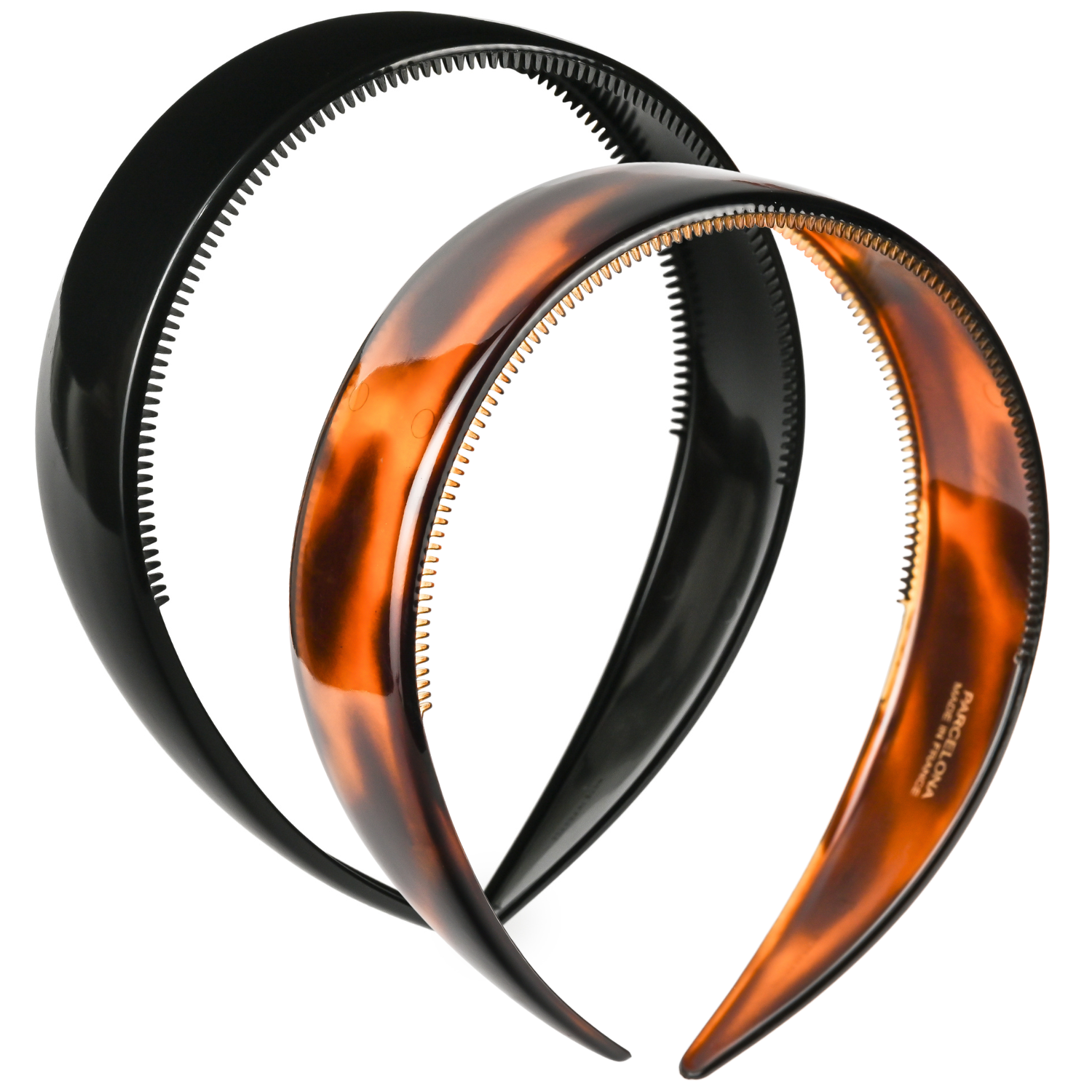 Tortoiseshell and black headbands on a white background