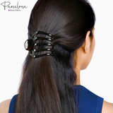 Model wearing Parcelona tortoise shell French hair claw for half-up hairstyle