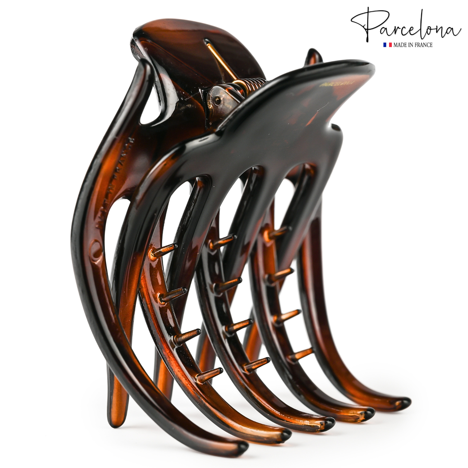 Side angle of Parcelona tortoise shell hair claw highlighting interlocking teeth and design