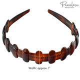 Brown headband with a measurement label on a white background, featuring the 'Parcelona' brand.