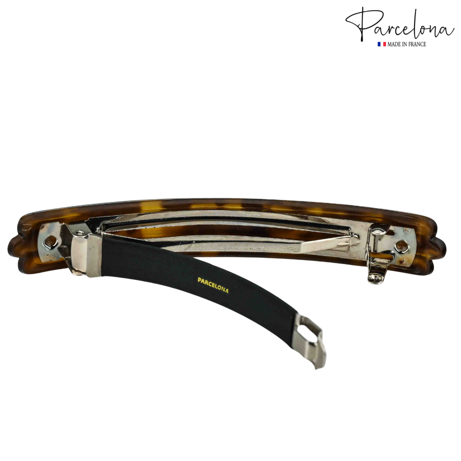 Open clasp of Savana French barrette with adjustable lock design