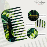 Comb with green leaf pattern and 'Parcelona' branding, featuring rounded prongs and elegant design.