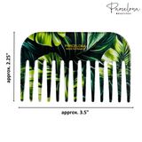 Tropical leaf-patterned comb with dimensions and 'Parcelona' branding on a white background