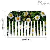 Hair comb with daisy design and 'Parcelona' branding, shown with dimensions.