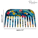 Colorful comb with tropical design and 'Parcelona' branding, showing dimensions.