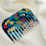 Colorful comb with toucan design and 'Parcelona' branding on a white background