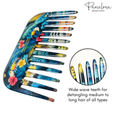 Colorful hair comb with Parcelona branding on a white background