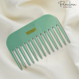 Green comb with 'Made in France' text on a white background, featuring the 'Parcelona' brand.