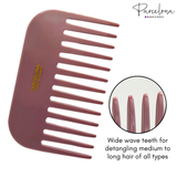 Pink comb with wide wave teeth, branded 'Parcelona', on a white background.