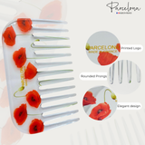 Hair comb with red floral design and 'Parcelona' branding on a white background