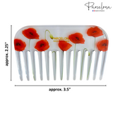Hair comb with red poppy design and 'Parcelona' branding, shown with dimensions.
